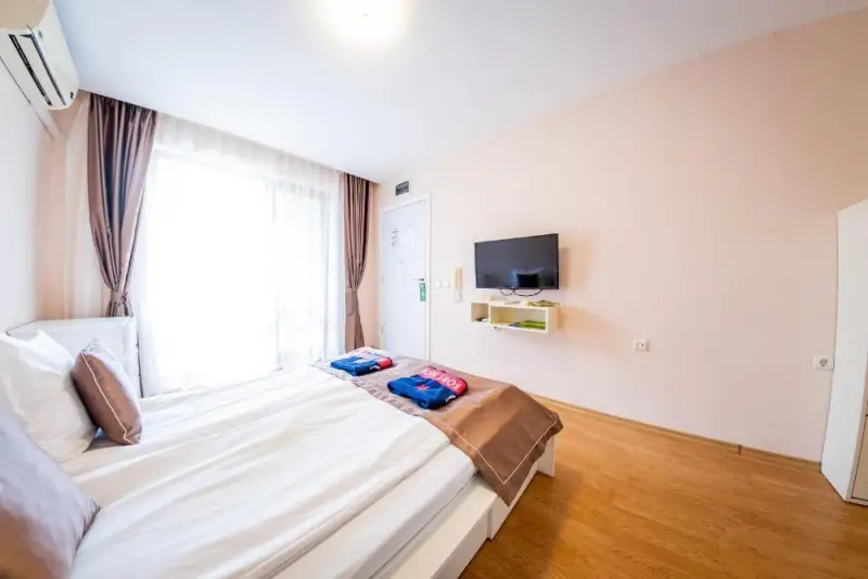 One-Bedroom Apartment with Balcony and Side Sea View (2 Adults +2 Children)