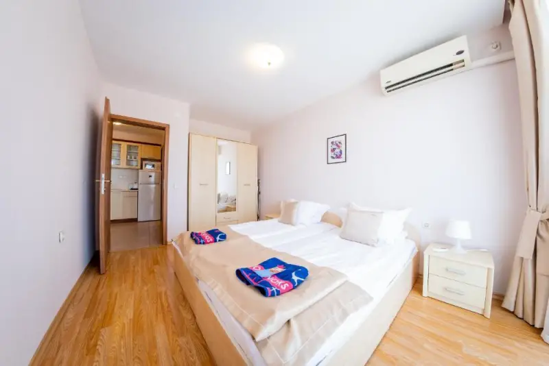 Two-Bedroom Apartment with Balcony and Side Sea View (4 Adults + 2 Children)