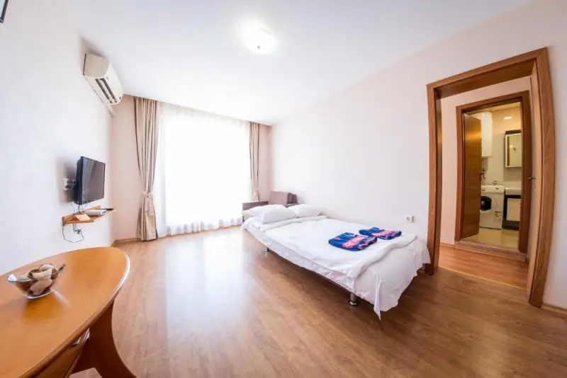 Three-Bedroom Apartment with Balcony and Side Sea View