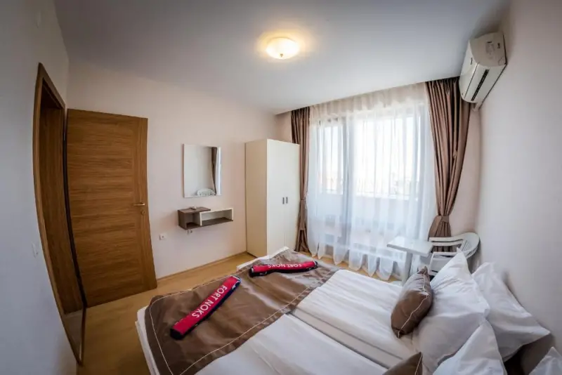 One-Bedroom Apartment with Balcony and Side Sea View (4 Adults)